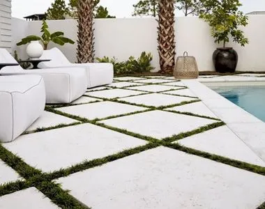 Shell white limestone tiles around an outdoor pool